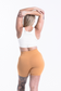 EMPWR YOU luxe ribbed seamless shorts in Tangerine