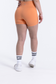 EMPWR YOU luxe ribbed seamless shorts in Pumpkin