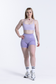EMPWR YOU adapt cross-back sports bra in Lilac